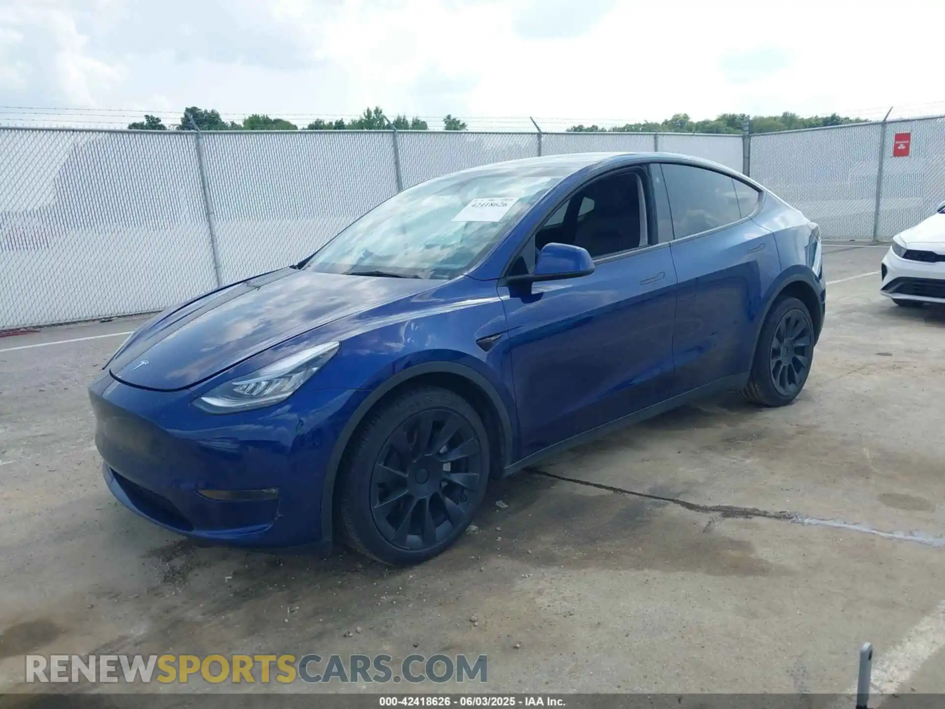 2 fotografías del automóvil dañado 7SAYGDEE3PA029417 TESLA MODEL Y 2023