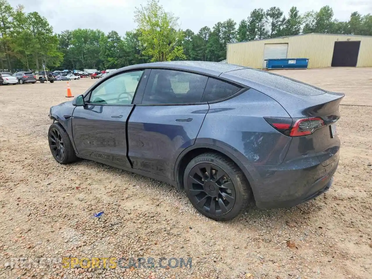 2 fotografías del automóvil dañado 7SAYGDEE3PA042930 TESLA MODEL Y 2023