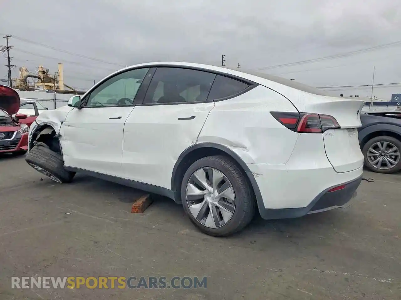 2 fotografías del automóvil dañado 7SAYGDEE3PA075149 TESLA MODEL Y 2023