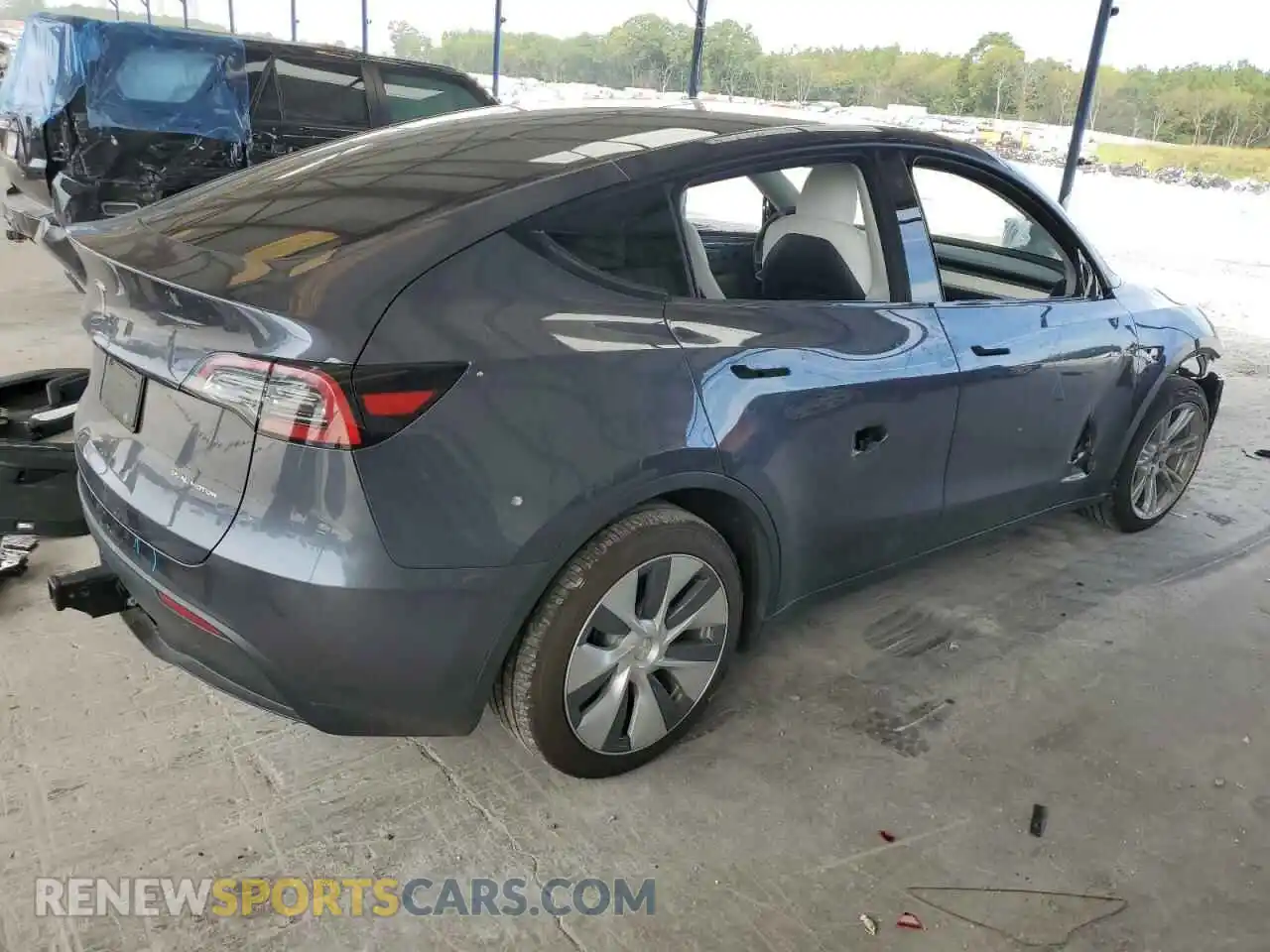 3 Photograph of a damaged car 7SAYGDEE3PF611553 TESLA MODEL Y 2023