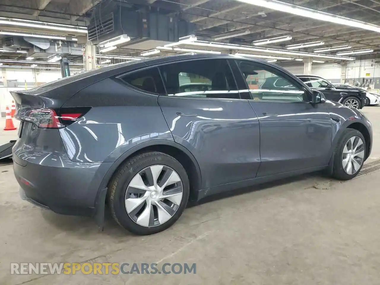 3 Photograph of a damaged car 7SAYGDEE3PF611665 TESLA MODEL Y 2023