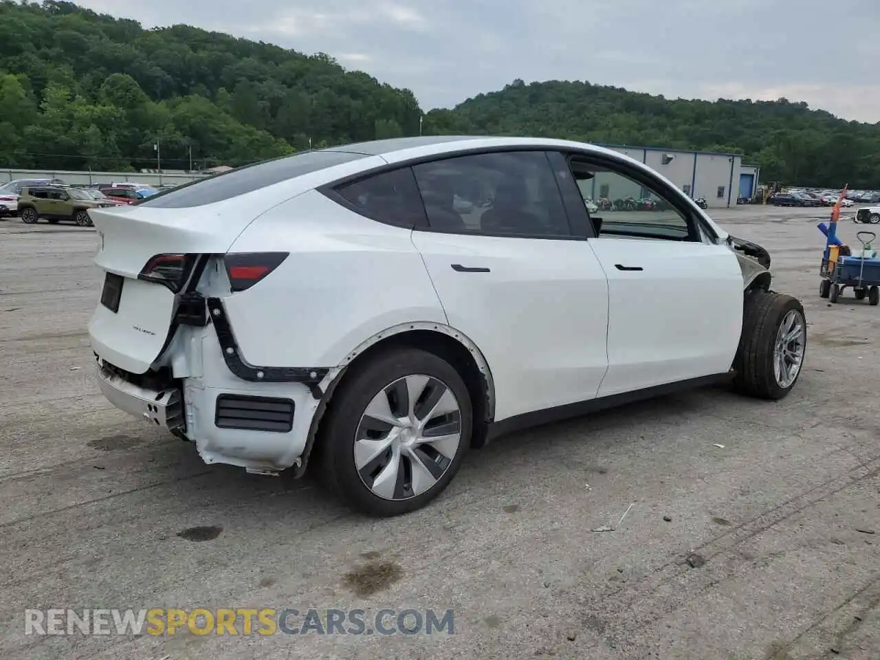 3 Photograph of a damaged car 7SAYGDEE3PF799801 TESLA MODEL Y 2023