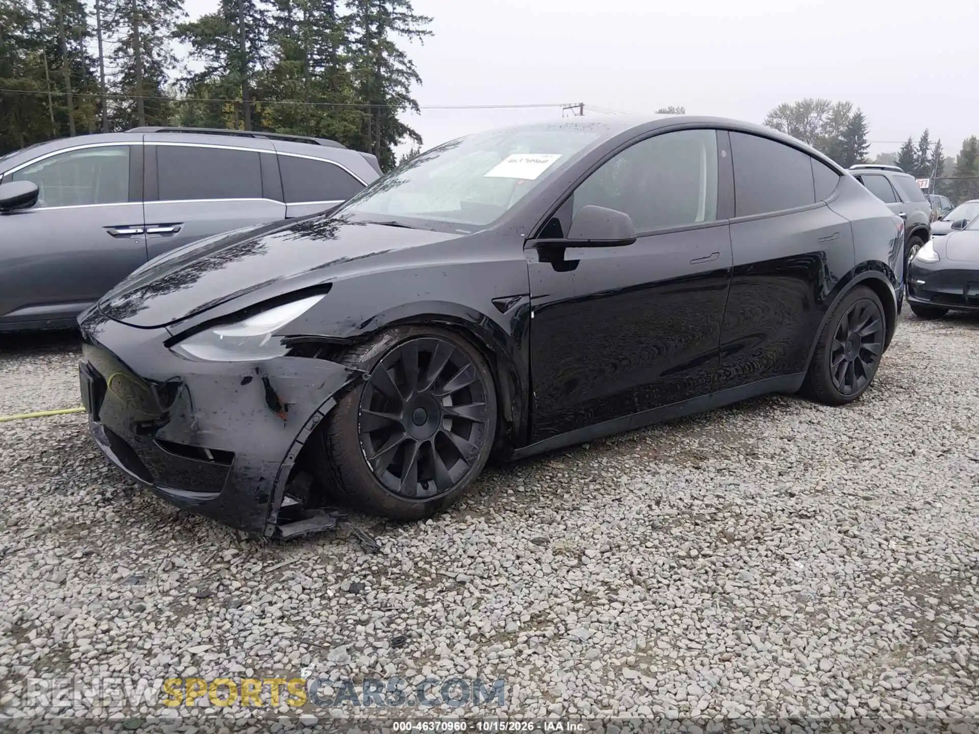 2 fotografías del automóvil dañado 7SAYGDEE3PF824339 TESLA MODEL Y 2023
