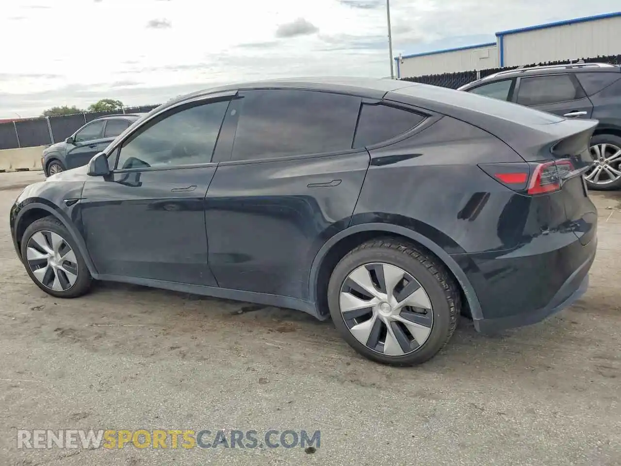2 fotografías del automóvil dañado 7SAYGDEE3PF880944 TESLA MODEL Y 2023