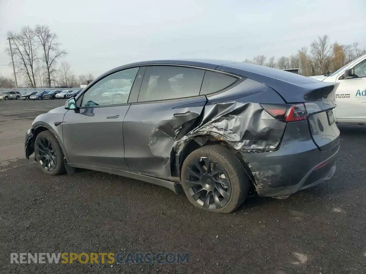 2 fotografías del automóvil dañado 7SAYGDEE3PF905891 TESLA MODEL Y 2023
