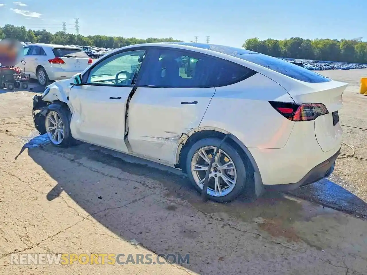 2 fotografías del automóvil dañado 7SAYGDEE4PA034805 TESLA MODEL Y 2023