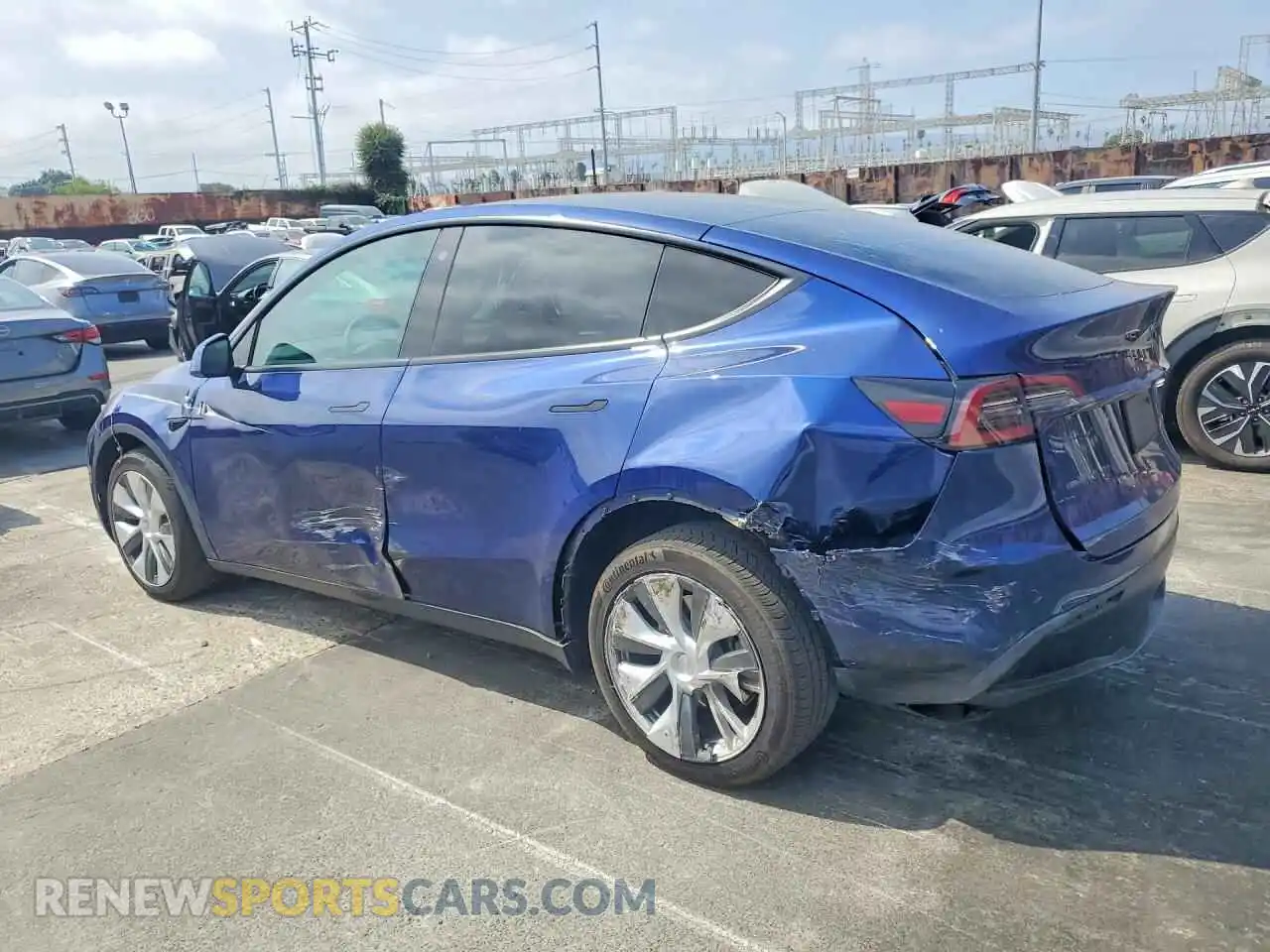2 fotografías del automóvil dañado 7SAYGDEE4PA082062 TESLA MODEL Y 2023