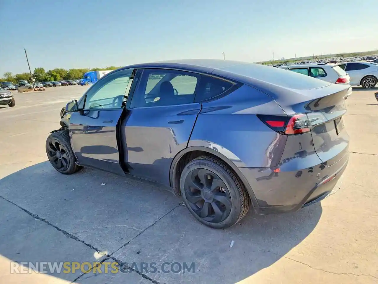 2 fotografías del automóvil dañado 7SAYGDEE4PA157701 TESLA MODEL Y 2023