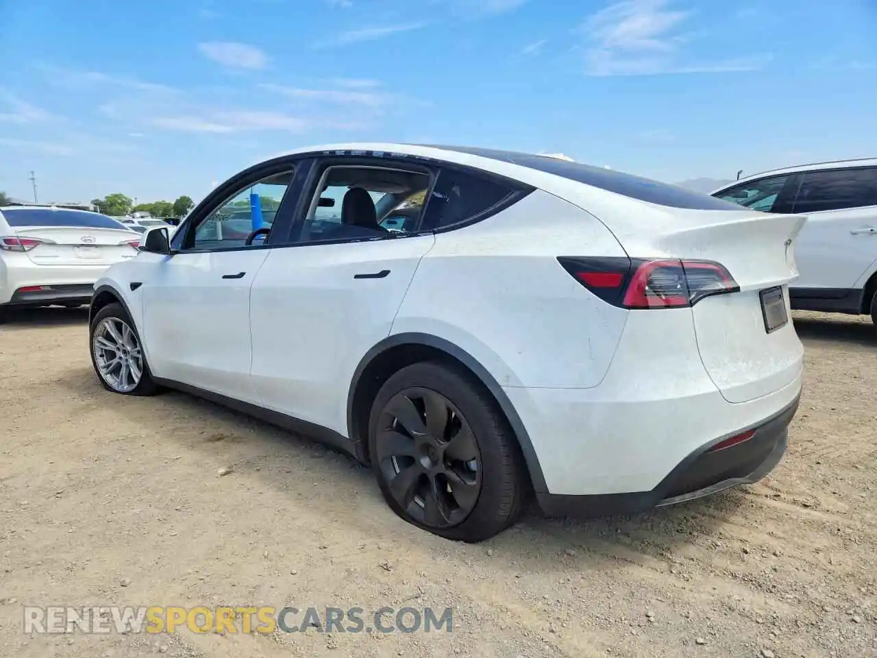 2 fotografías del automóvil dañado 7SAYGDEE5PA125680 TESLA MODEL Y 2023