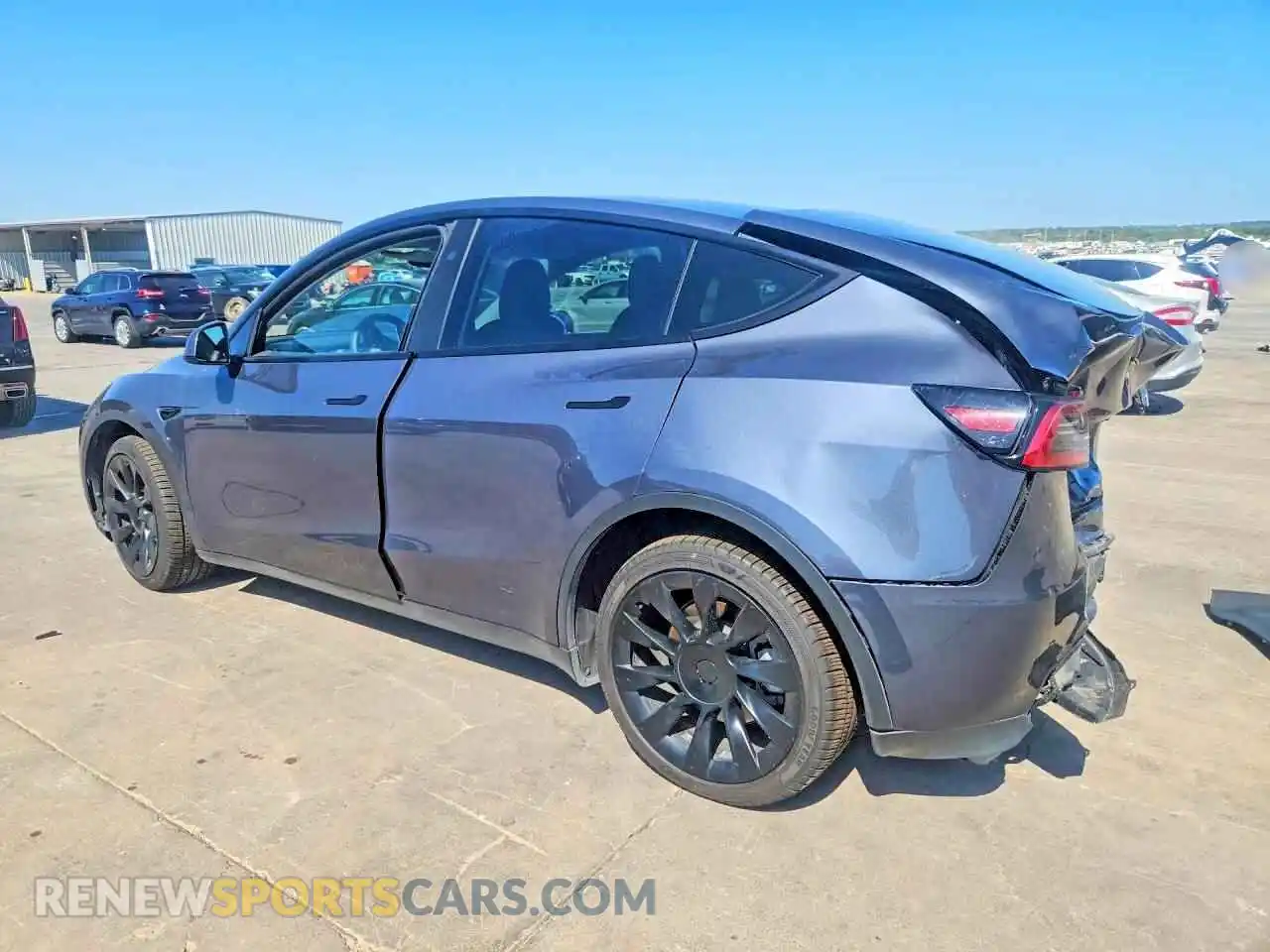 2 fotografías del automóvil dañado 7SAYGDEE5PA154158 TESLA MODEL Y 2023