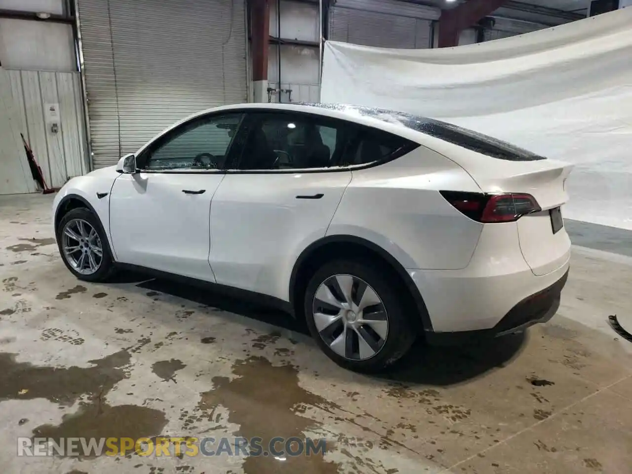 2 fotografías del automóvil dañado 7SAYGDEE5PA170733 TESLA MODEL Y 2023
