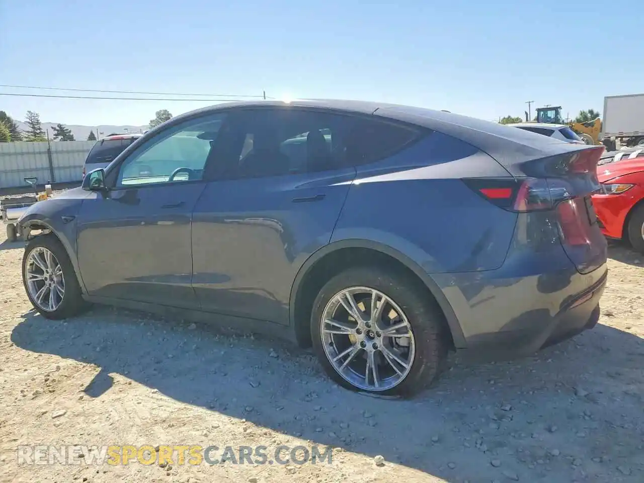 2 fotografías del automóvil dañado 7SAYGDEE5PF909649 TESLA MODEL Y 2023