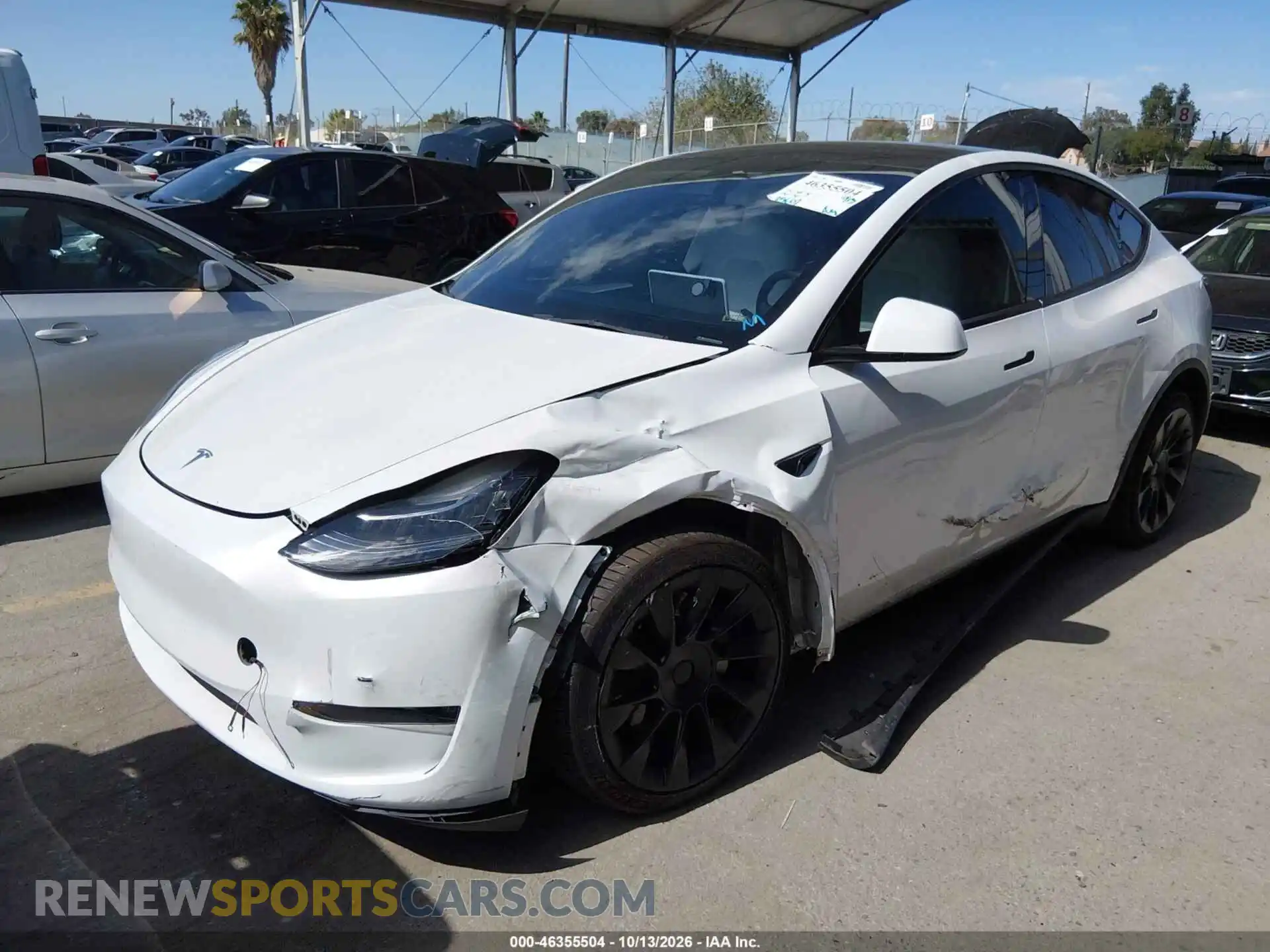 2 fotografías del automóvil dañado 7SAYGDEE6PA156873 TESLA MODEL Y 2023