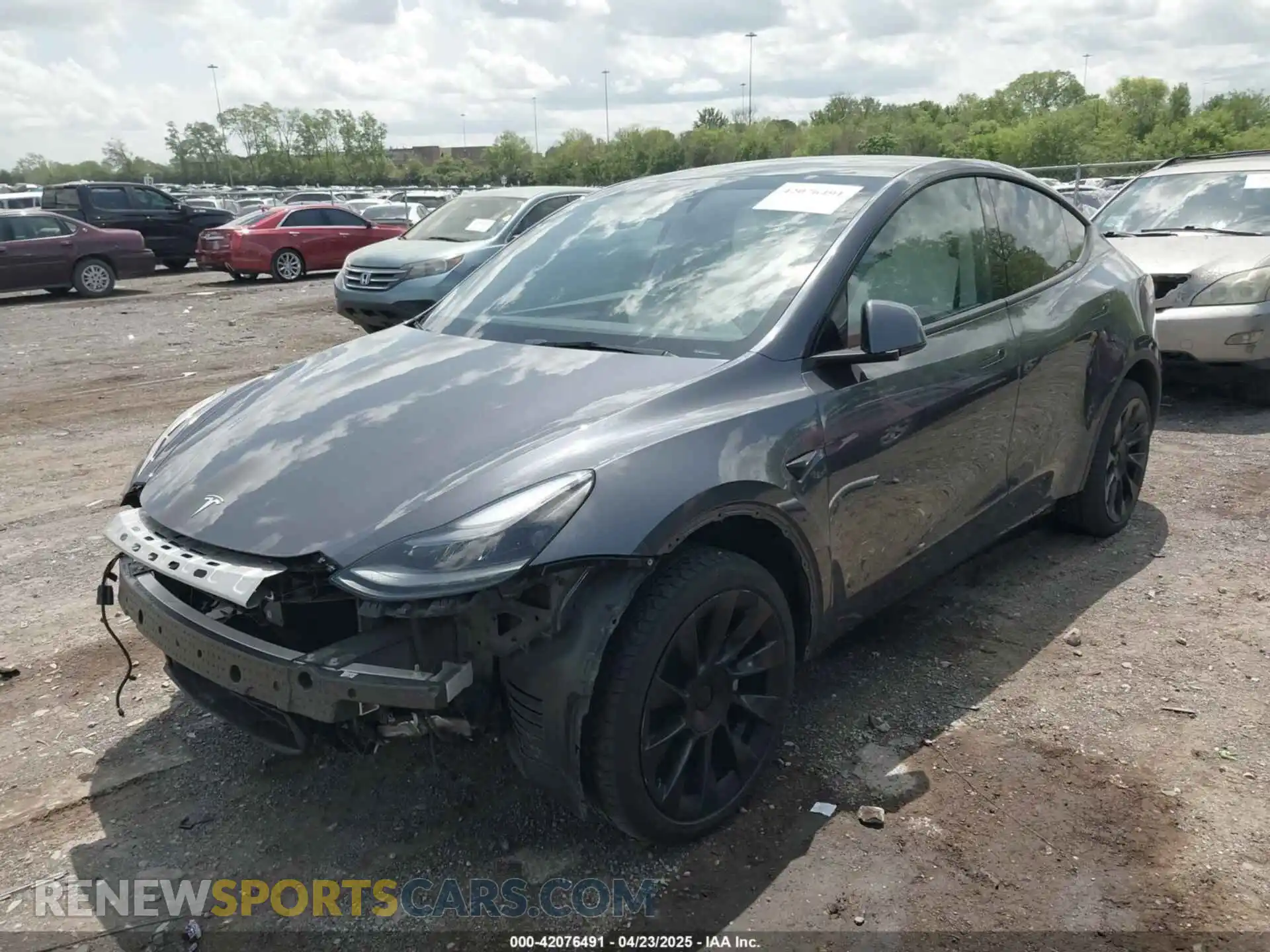 2 fotografías del automóvil dañado 7SAYGDEE6PA162186 TESLA MODEL Y 2023