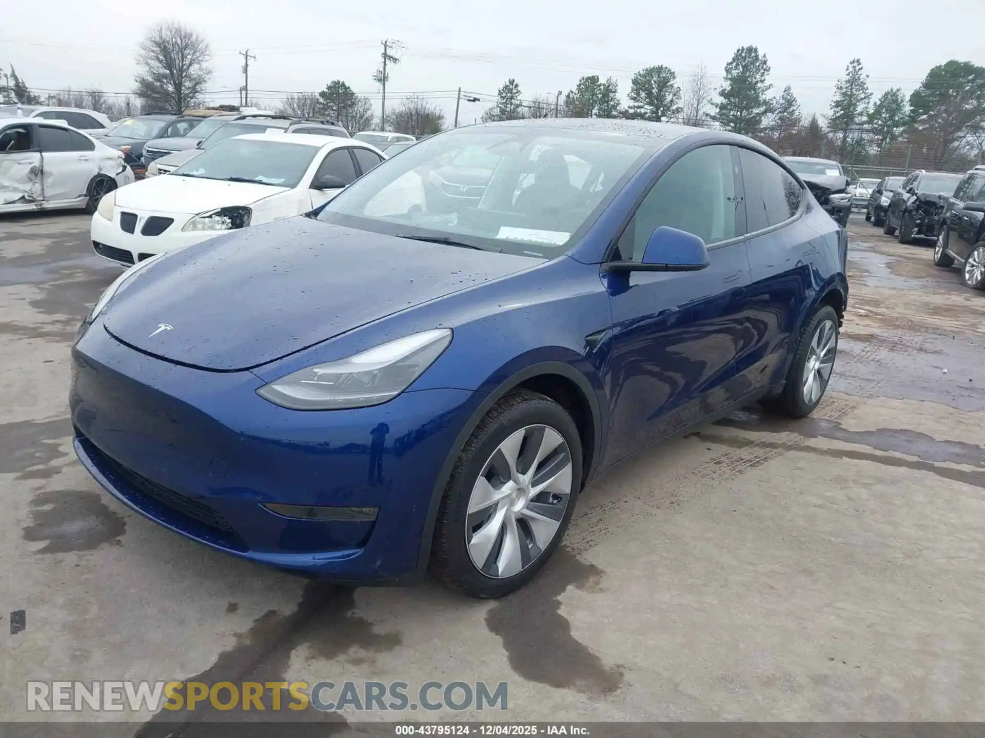 2 fotografías del automóvil dañado 7SAYGDEE6PA201021 TESLA MODEL Y 2023