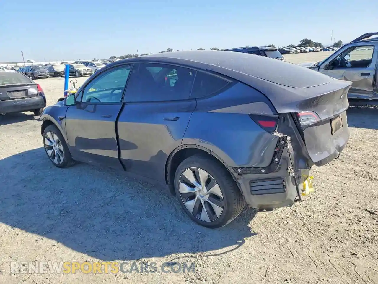 2 fotografías del automóvil dañado 7SAYGDEE6PF711761 TESLA MODEL Y 2023