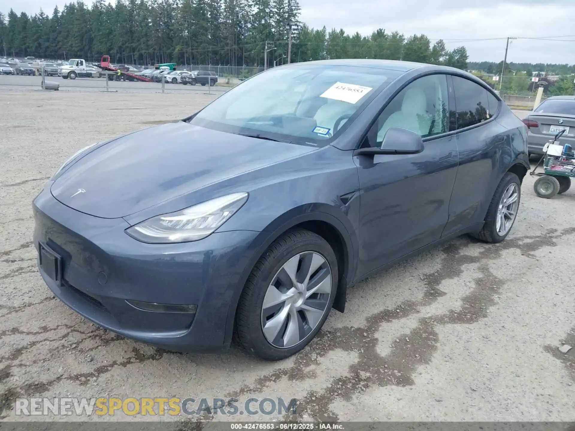 2 Photograph of a damaged car 7SAYGDEE7PA159345 TESLA MODEL Y 2023