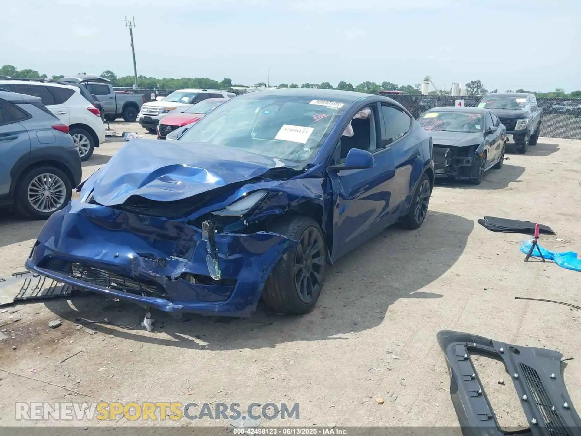 2 fotografías del automóvil dañado 7SAYGDEE7PA171396 TESLA MODEL Y 2023