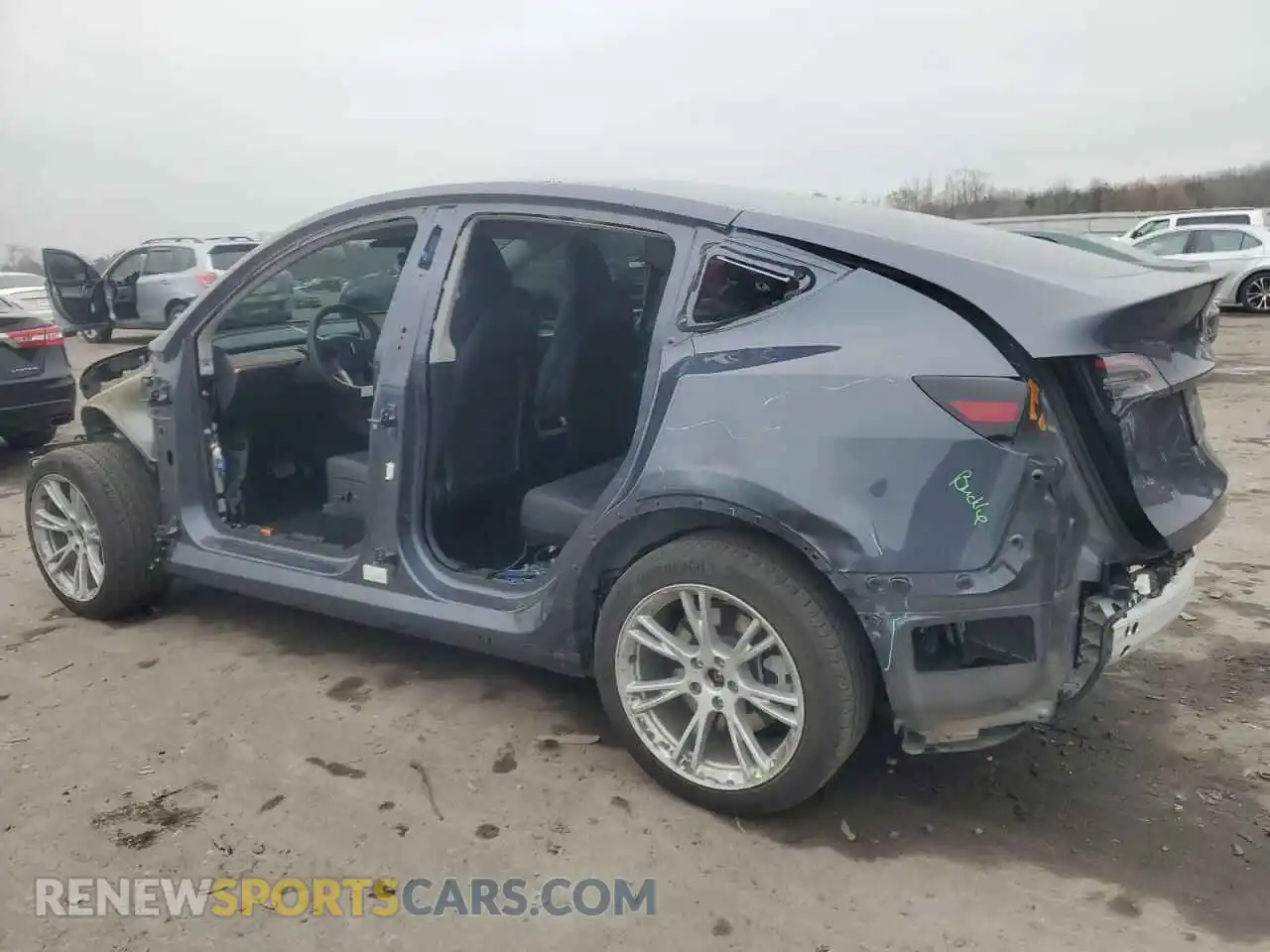 2 fotografías del automóvil dañado 7SAYGDEE7PF611264 TESLA MODEL Y 2023
