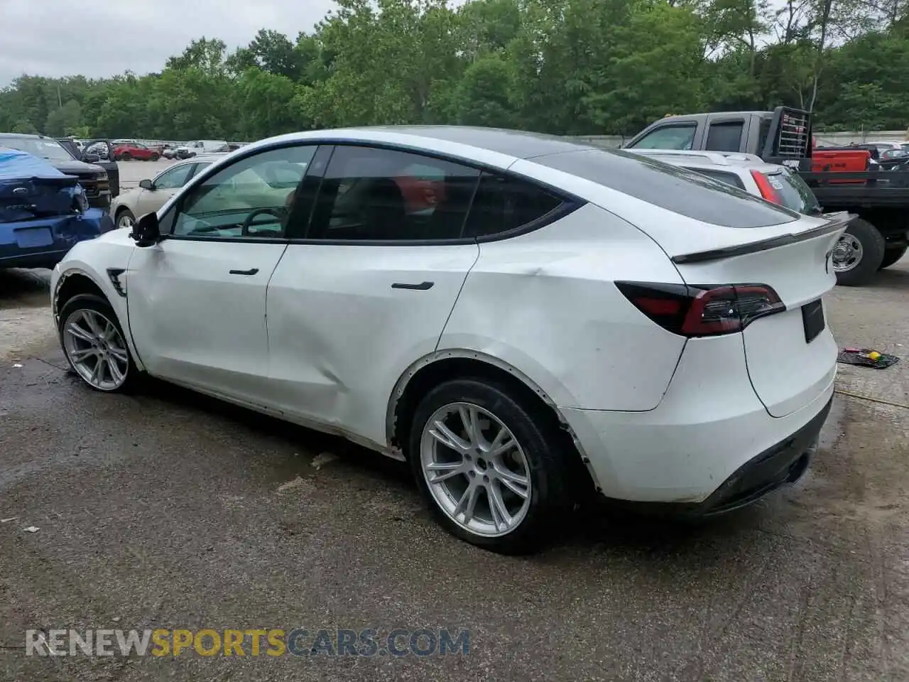 2 fotografías del automóvil dañado 7SAYGDEE7PF759687 TESLA MODEL Y 2023