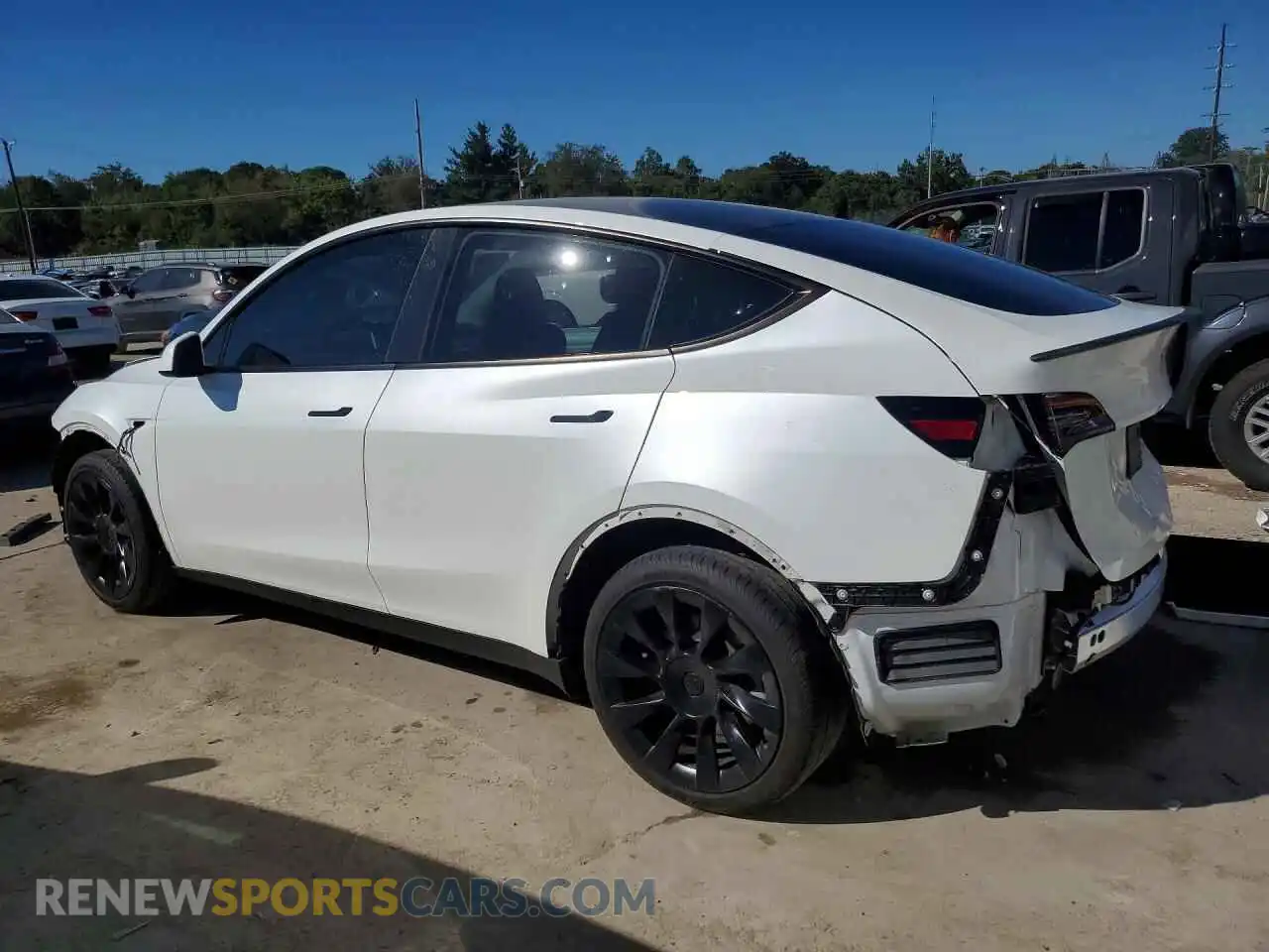 2 fotografías del automóvil dañado 7SAYGDEE8PA203675 TESLA MODEL Y 2023