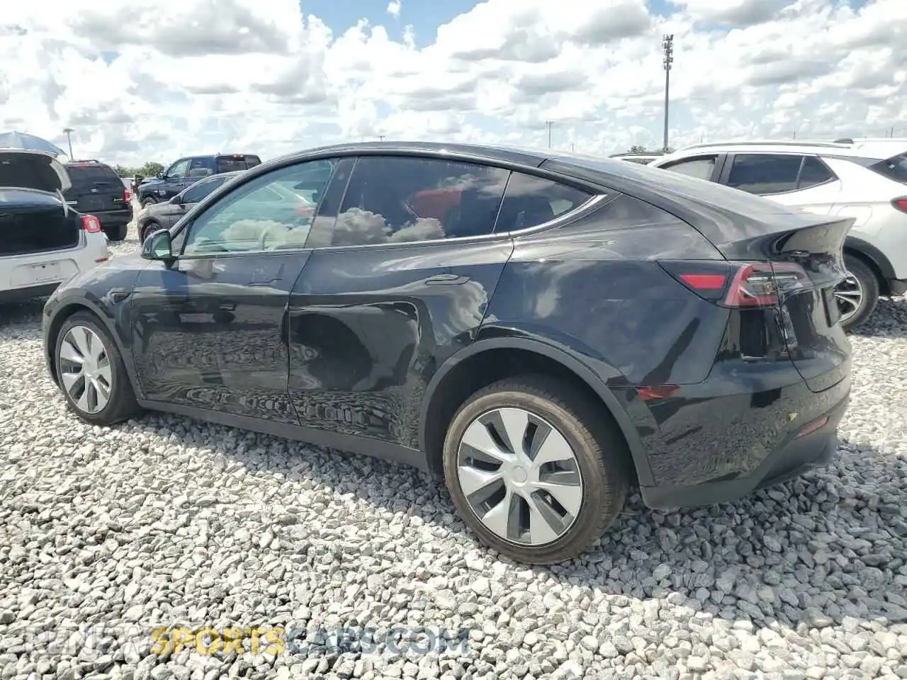 2 fotografías del automóvil dañado 7SAYGDEE8PF648436 TESLA MODEL Y 2023