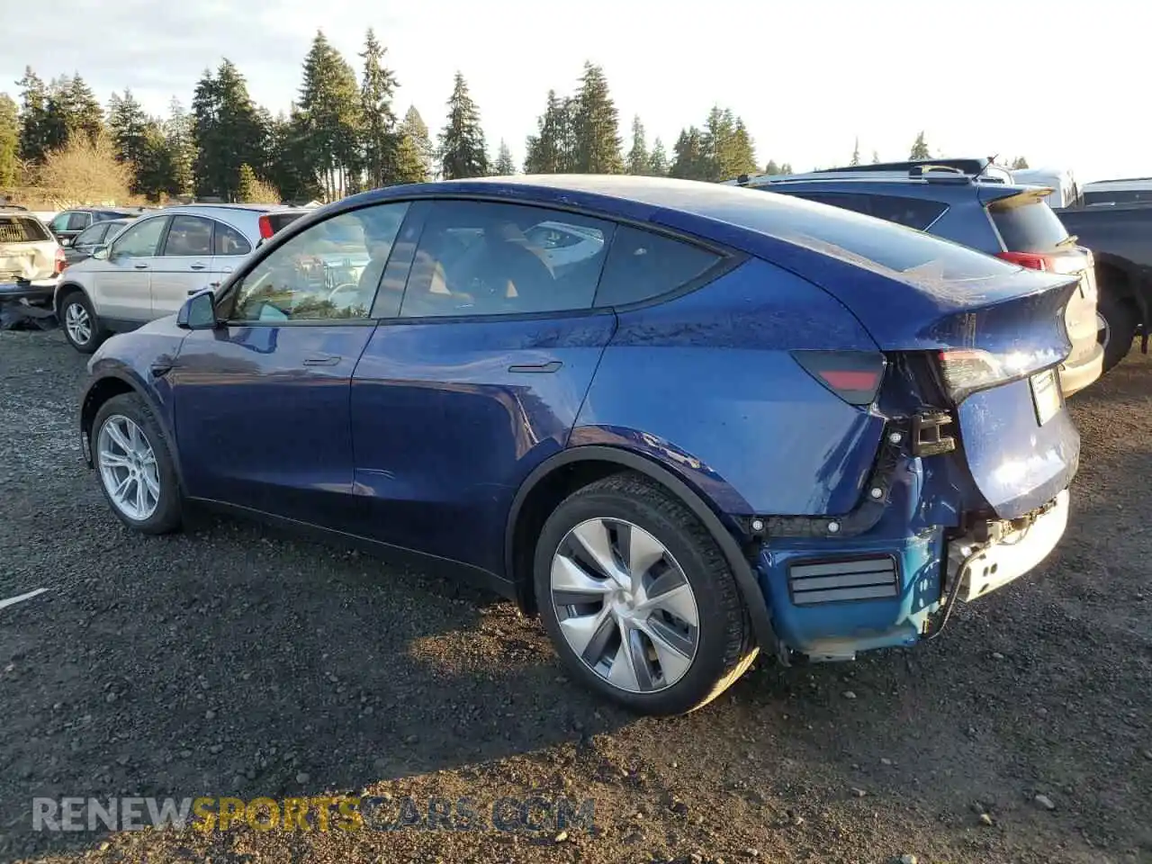 2 fotografías del automóvil dañado 7SAYGDEE9PA163297 TESLA MODEL Y 2023