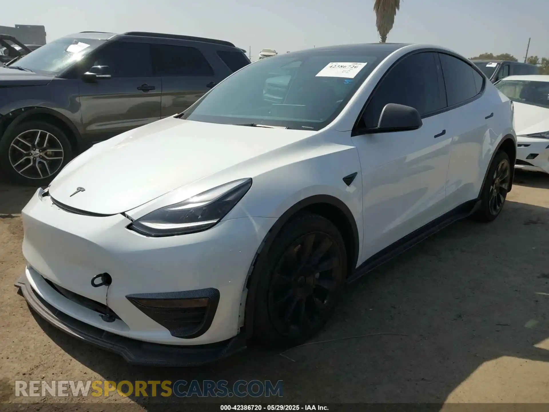 2 Photograph of a damaged car 7SAYGDEE9PF887283 TESLA MODEL Y 2023