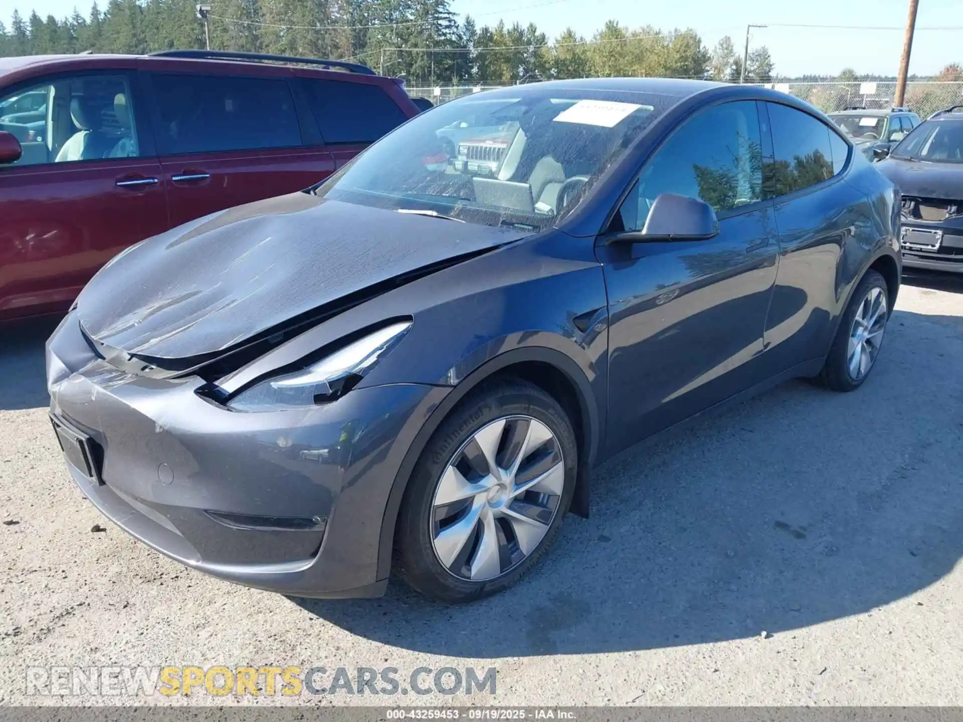 2 fotografías del automóvil dañado 7SAYGDEE9PF922212 TESLA MODEL Y 2023