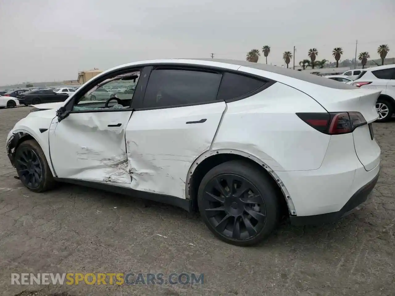 2 Photograph of a damaged car 7SAYGDEEXPA042715 TESLA MODEL Y 2023