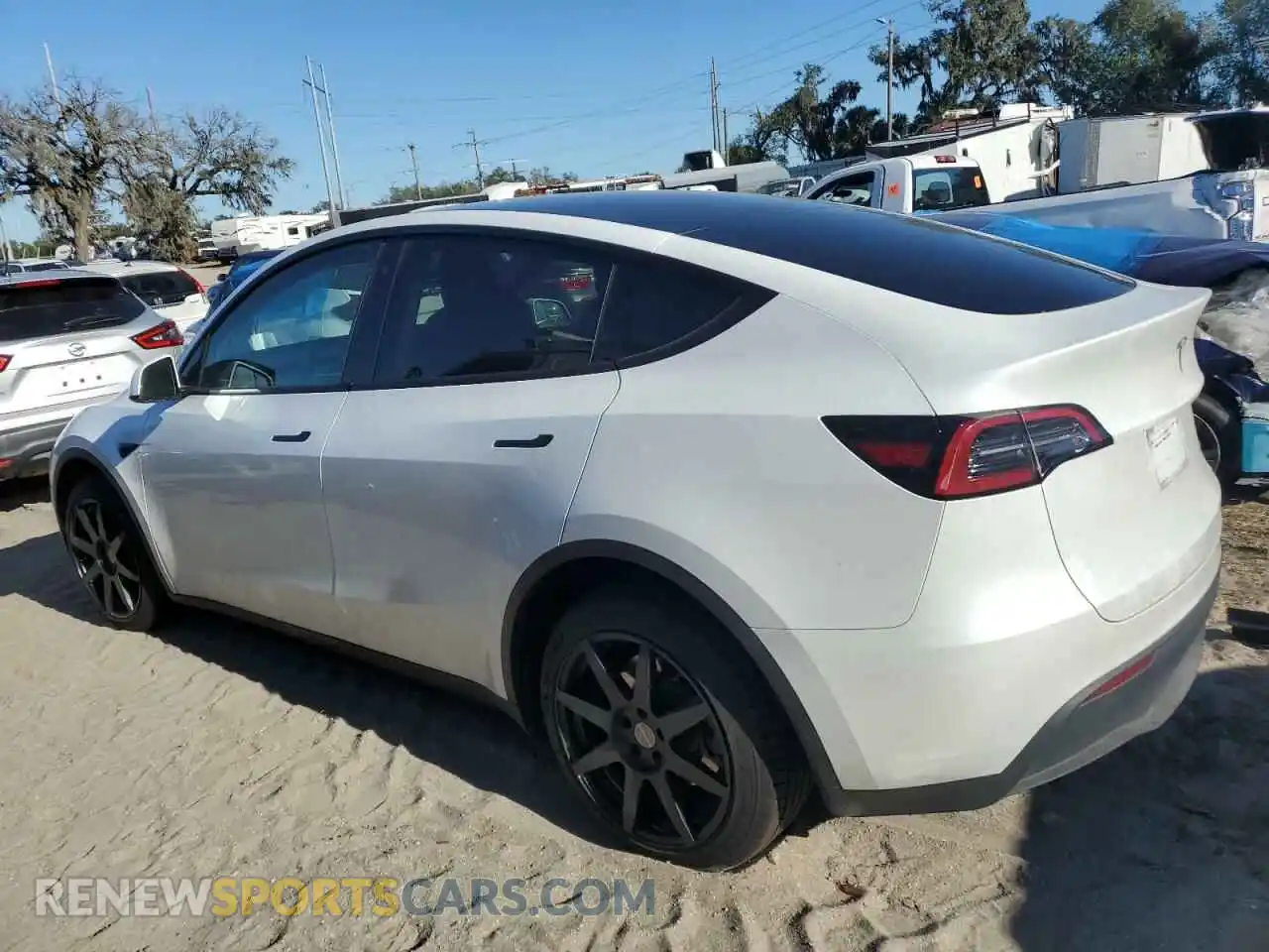 2 fotografías del automóvil dañado 7SAYGDEEXPA114111 TESLA MODEL Y 2023