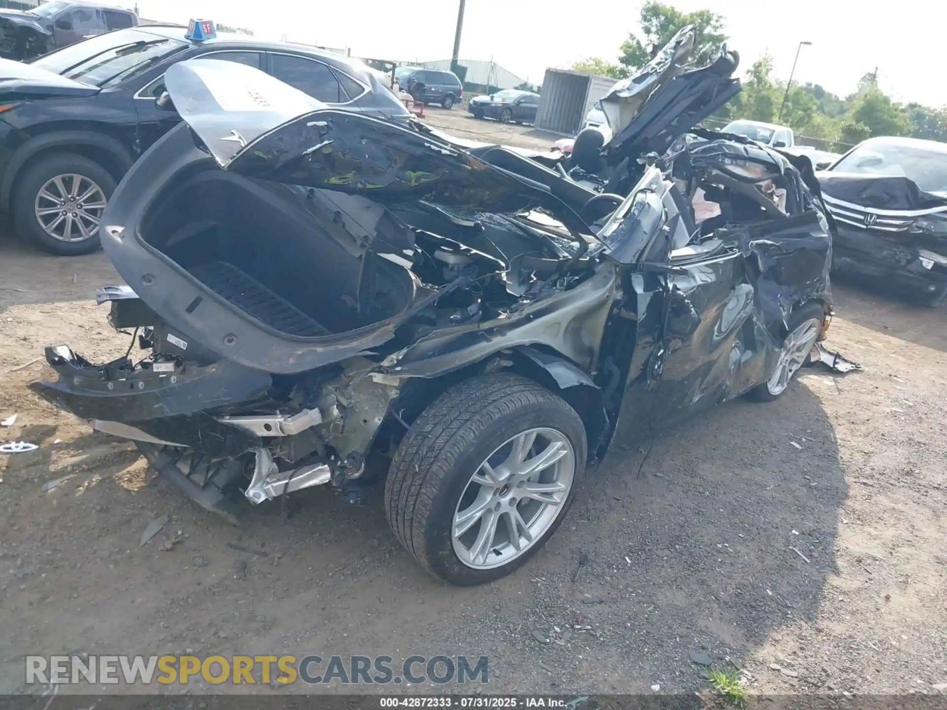 2 Photograph of a damaged car 7SAYGDEEXPA140336 TESLA MODEL Y 2023