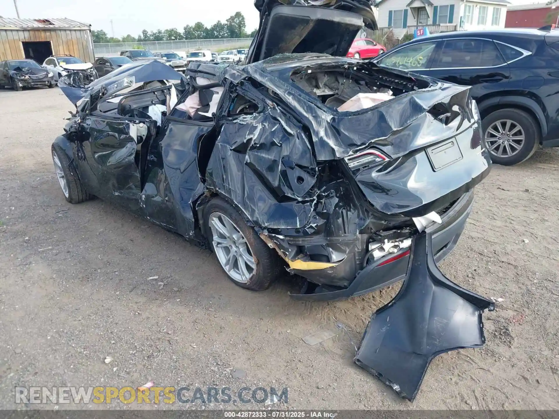 3 Photograph of a damaged car 7SAYGDEEXPA140336 TESLA MODEL Y 2023