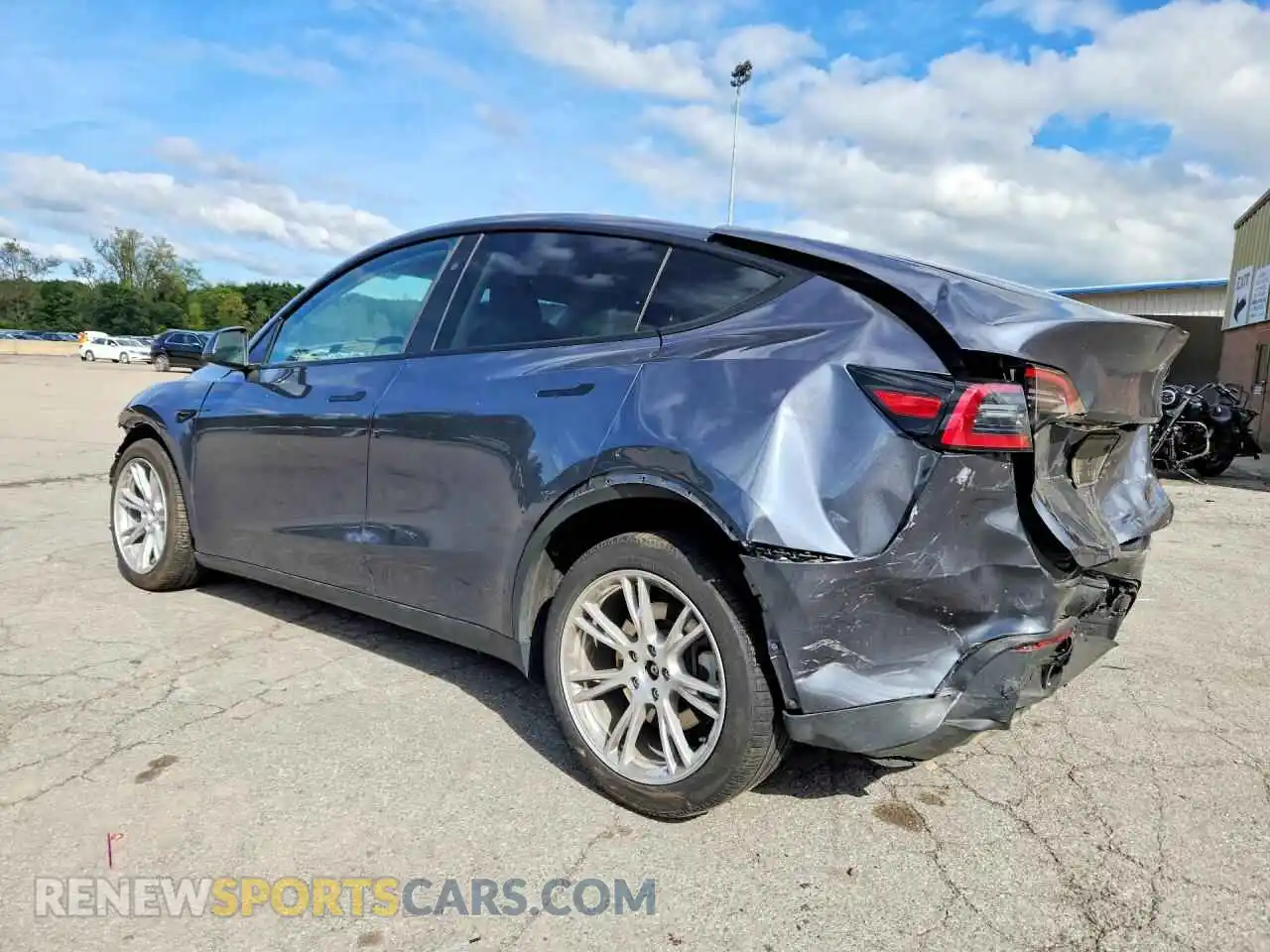 2 fotografías del automóvil dañado 7SAYGDEEXPA209302 TESLA MODEL Y 2023