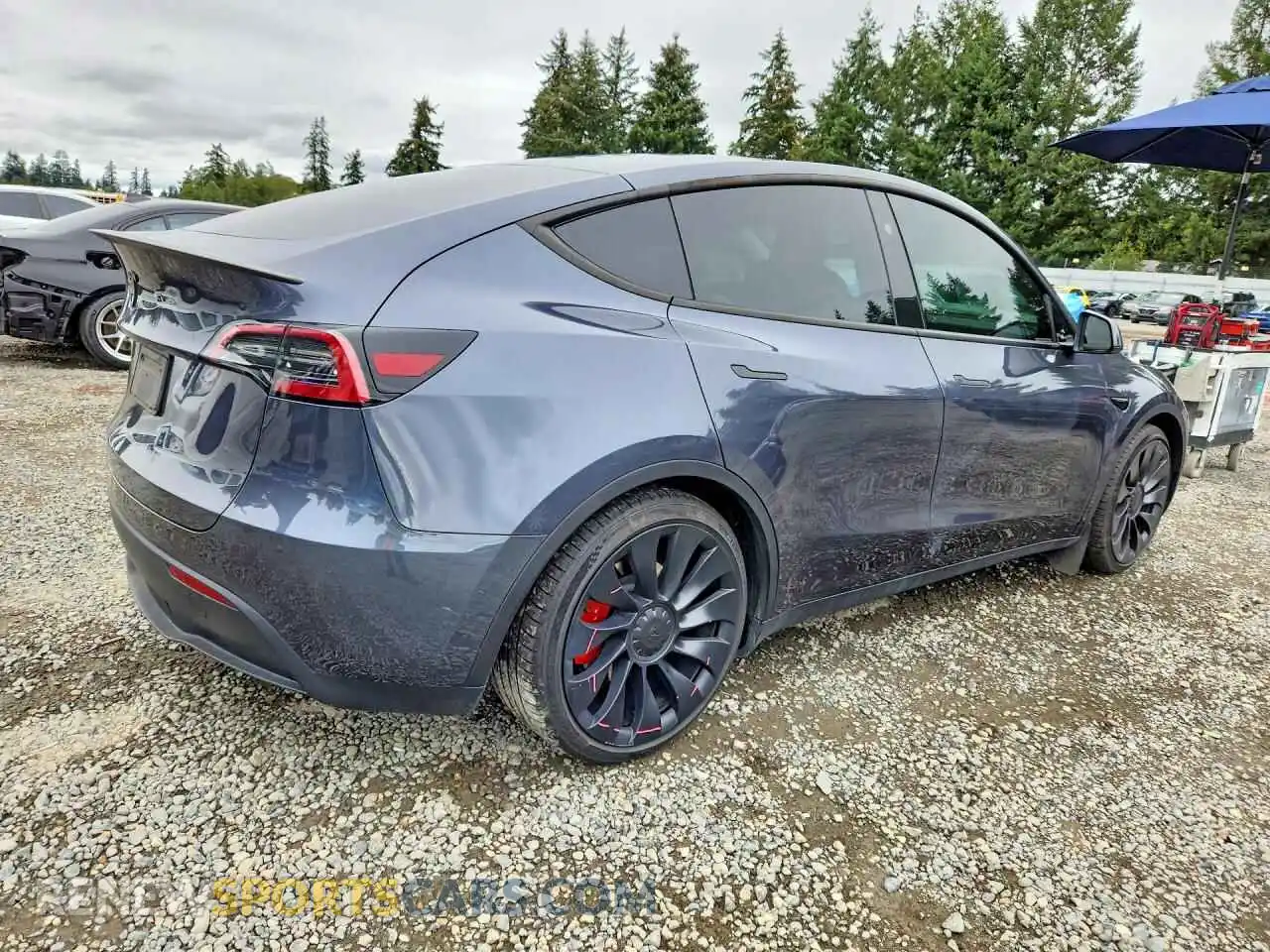 3 Photograph of a damaged car 7SAYGDEF0PF883194 TESLA MODEL Y 2023
