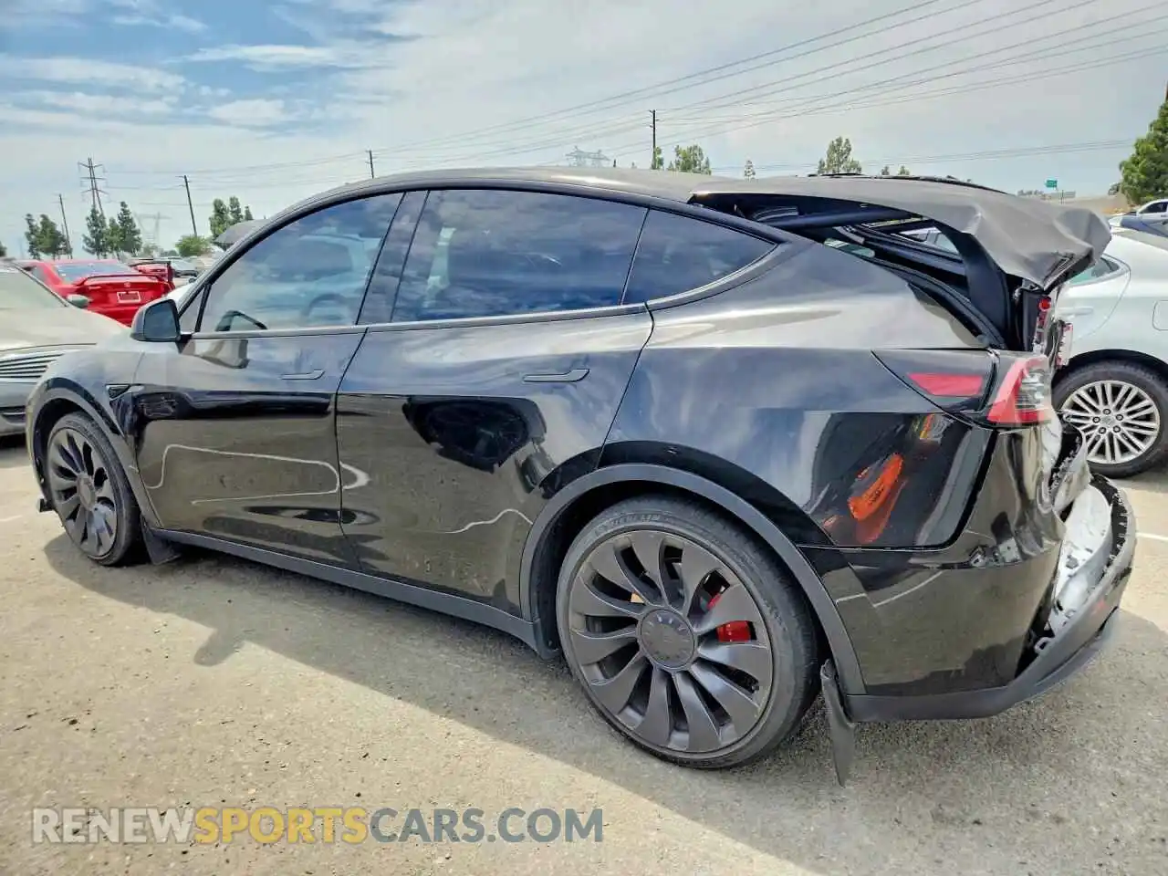 2 fotografías del automóvil dañado 7SAYGDEF2PF659683 TESLA MODEL Y 2023