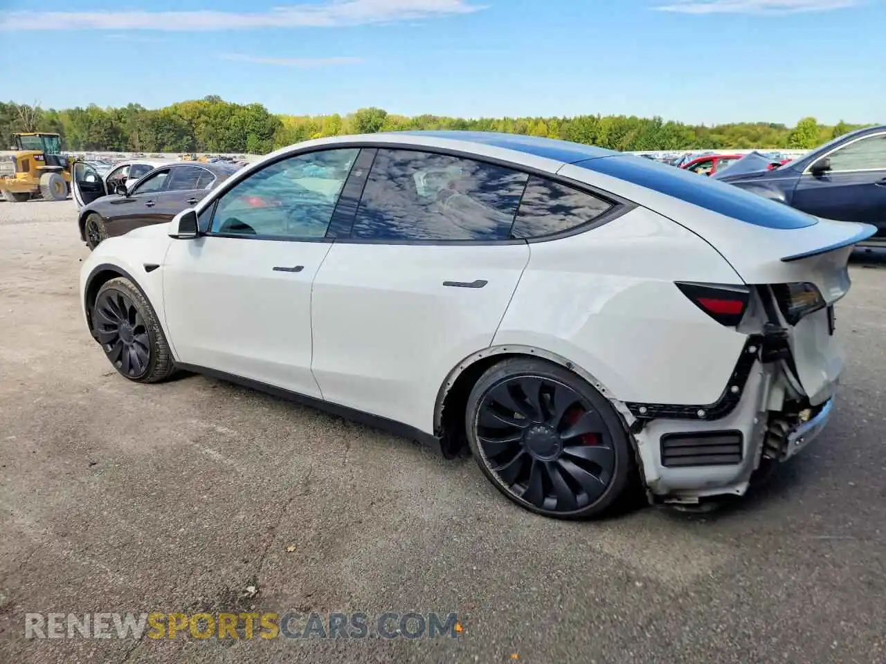 2 fotografías del automóvil dañado 7SAYGDEF2PF811235 TESLA MODEL Y 2023