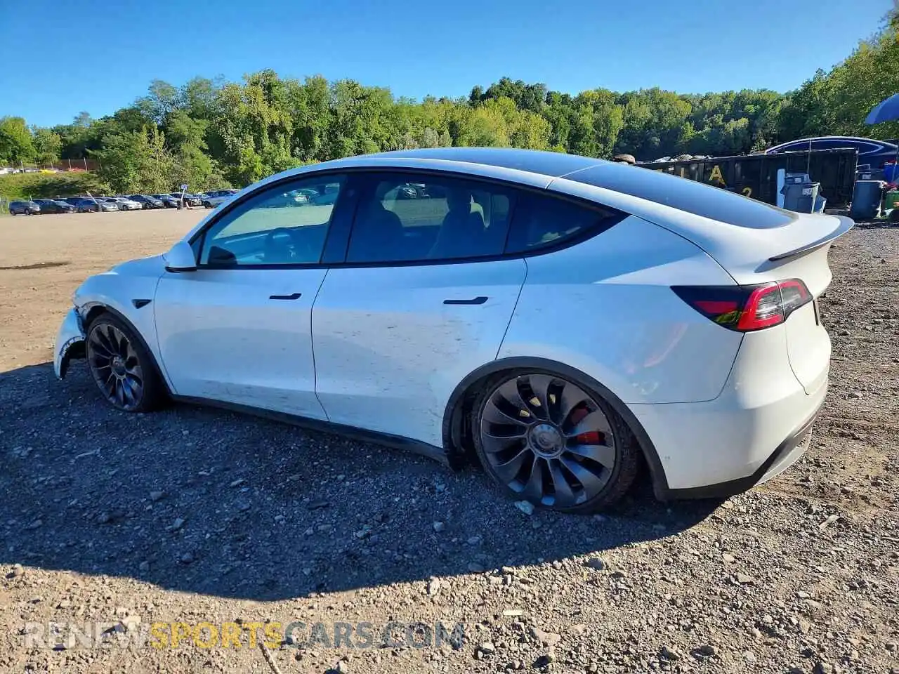 2 fotografías del automóvil dañado 7SAYGDEF3PF773899 TESLA MODEL Y 2023