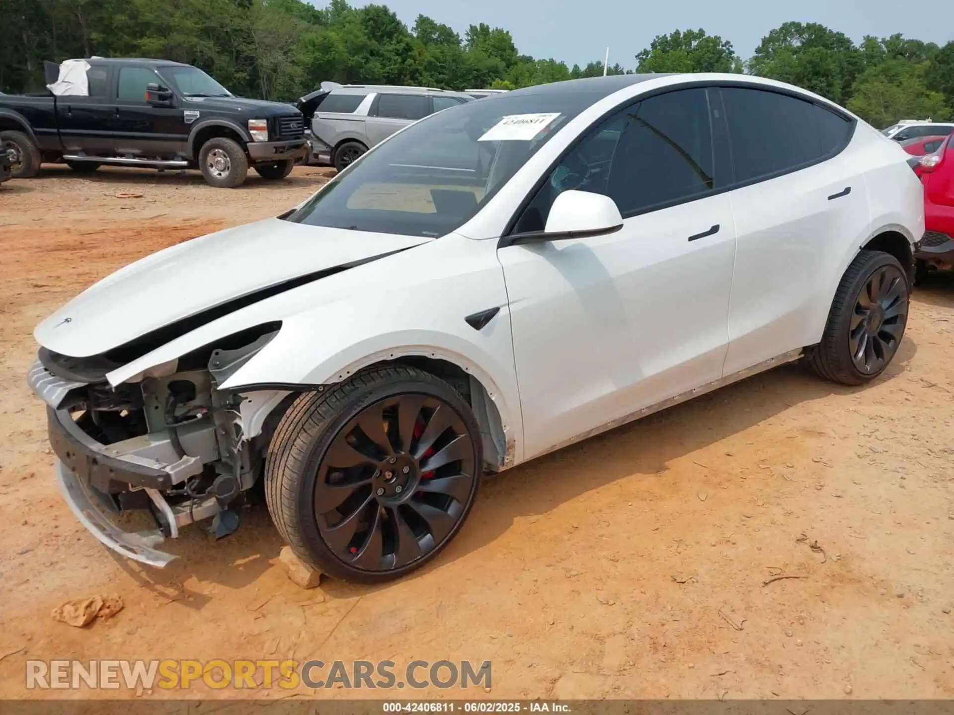 2 fotografías del automóvil dañado 7SAYGDEF3PF800681 TESLA MODEL Y 2023