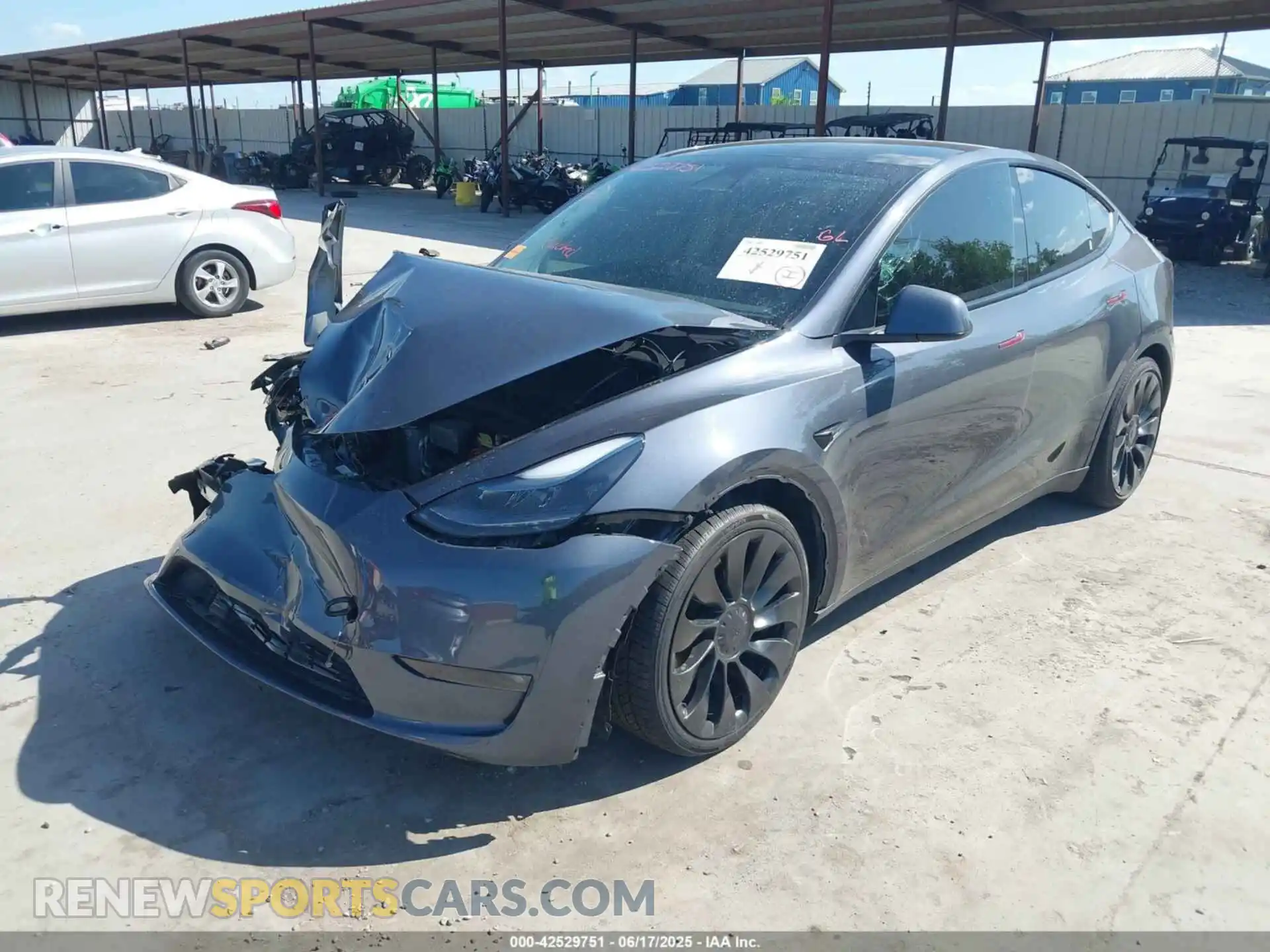 2 fotografías del automóvil dañado 7SAYGDEF5PF696100 TESLA MODEL Y 2023