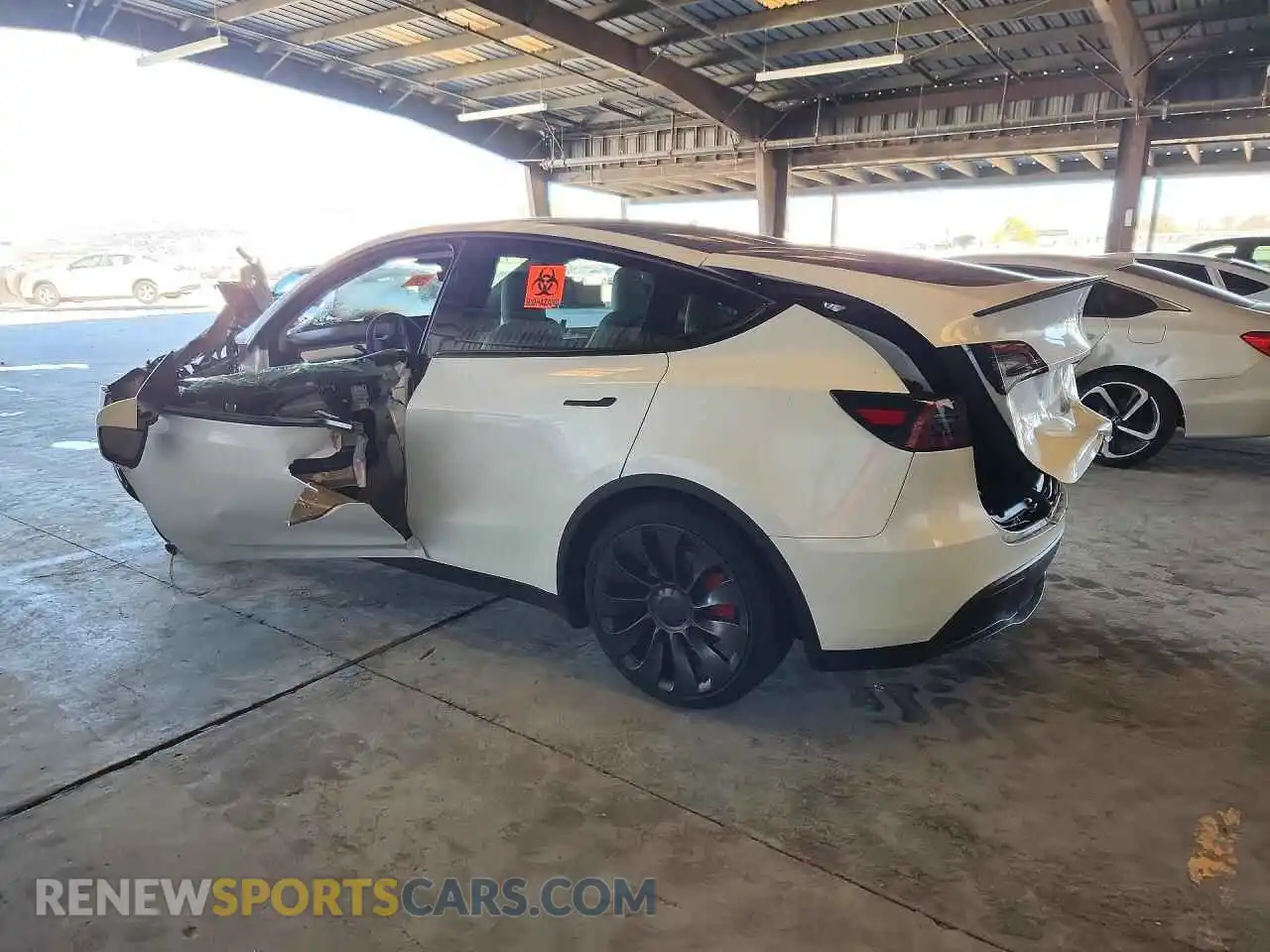 2 fotografías del automóvil dañado 7SAYGDEF6PF877674 TESLA MODEL Y 2023