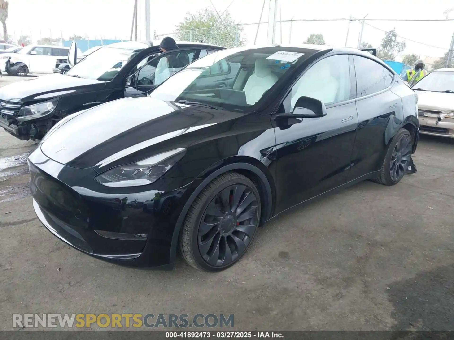 2 fotografías del automóvil dañado 7SAYGDEFXPF833273 TESLA MODEL Y 2023