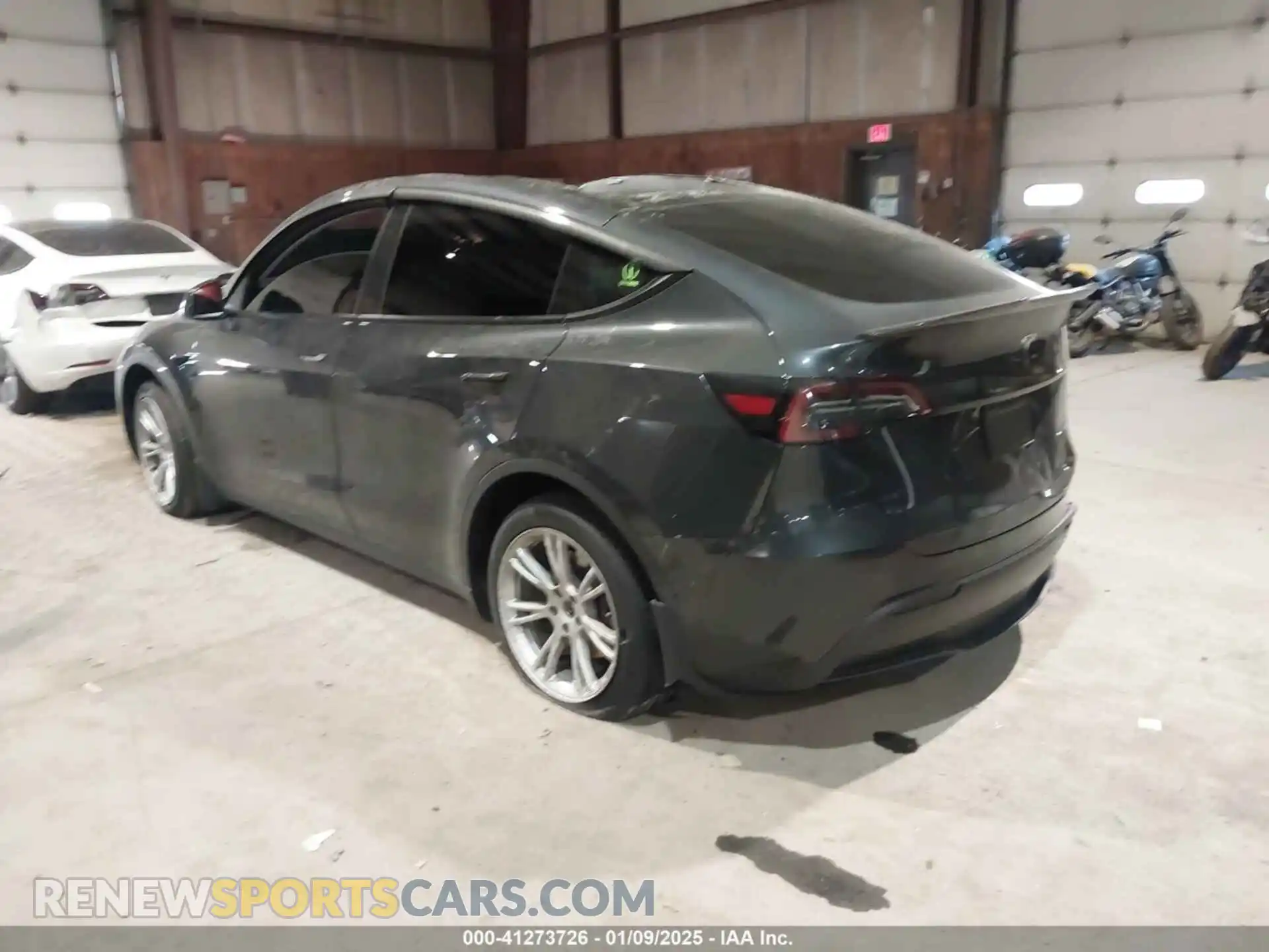 3 Photograph of a damaged car 7SAYGAEE1RF037181 TESLA MODEL Y 2024