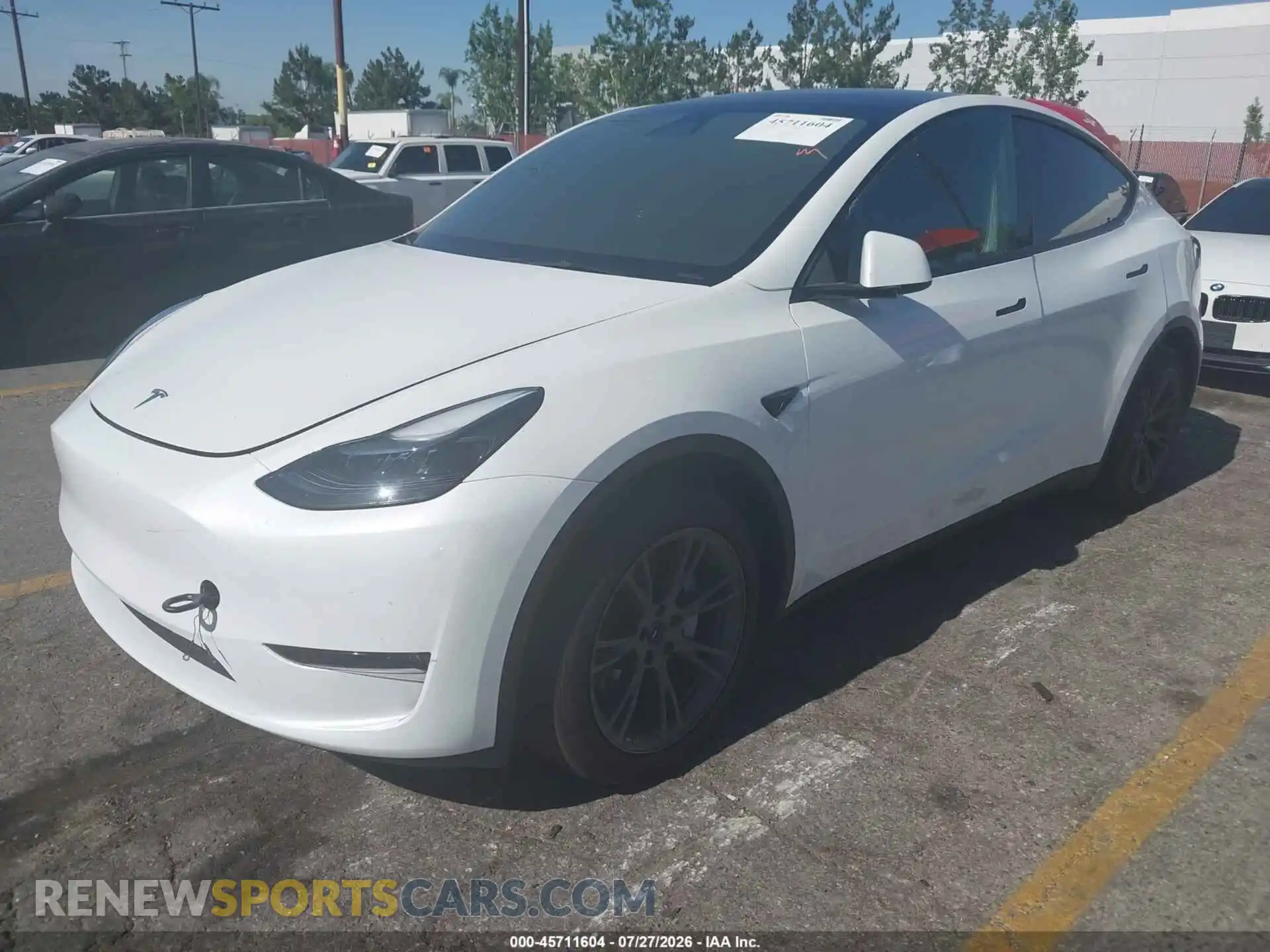 2 fotografías del automóvil dañado 7SAYGAEE1RF169051 TESLA MODEL Y 2024