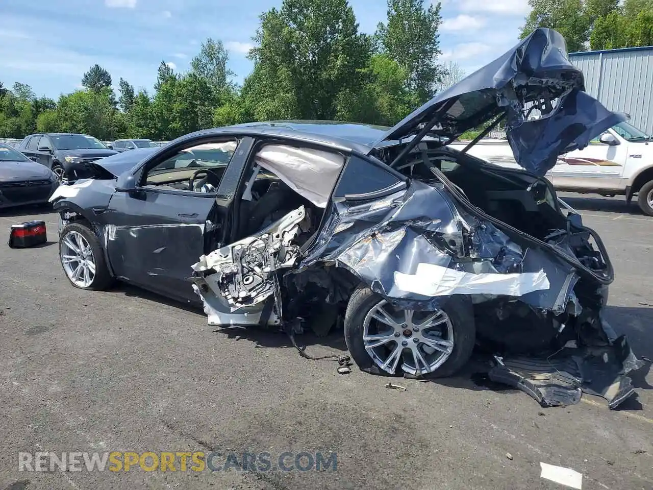 2 Photograph of a damaged car 7SAYGAEE1RF982048 TESLA MODEL Y 2024