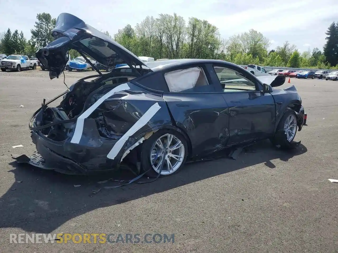 3 Photograph of a damaged car 7SAYGAEE1RF982048 TESLA MODEL Y 2024