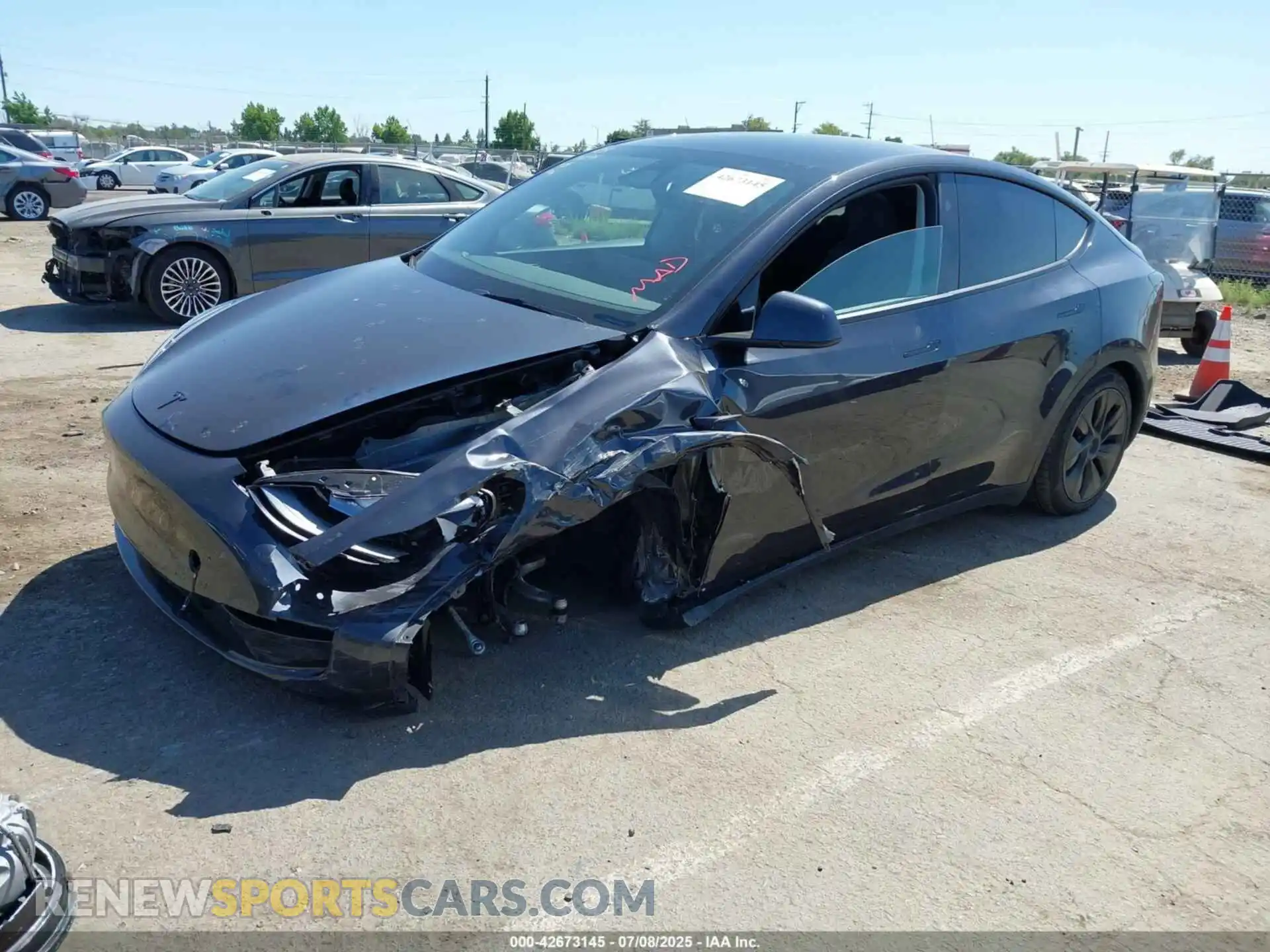 2 Photograph of a damaged car 7SAYGAEE2RF124068 TESLA MODEL Y 2024