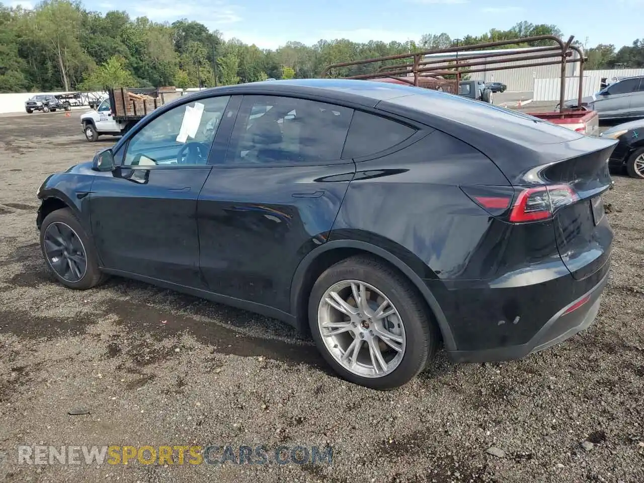 2 Photograph of a damaged car 7SAYGAEE2RF983385 TESLA MODEL Y 2024