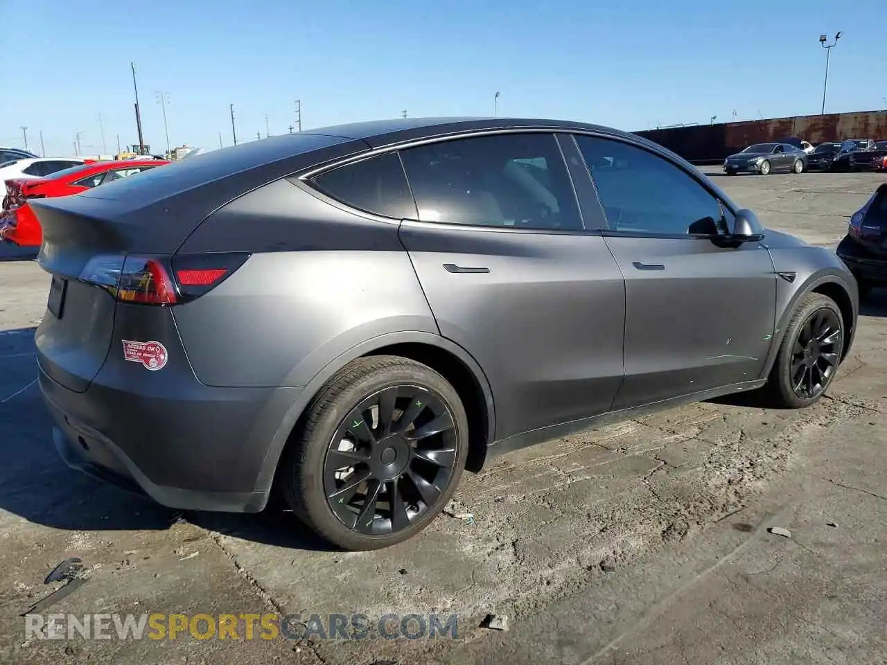 3 Photograph of a damaged car 7SAYGAEE3RF034377 TESLA MODEL Y 2024