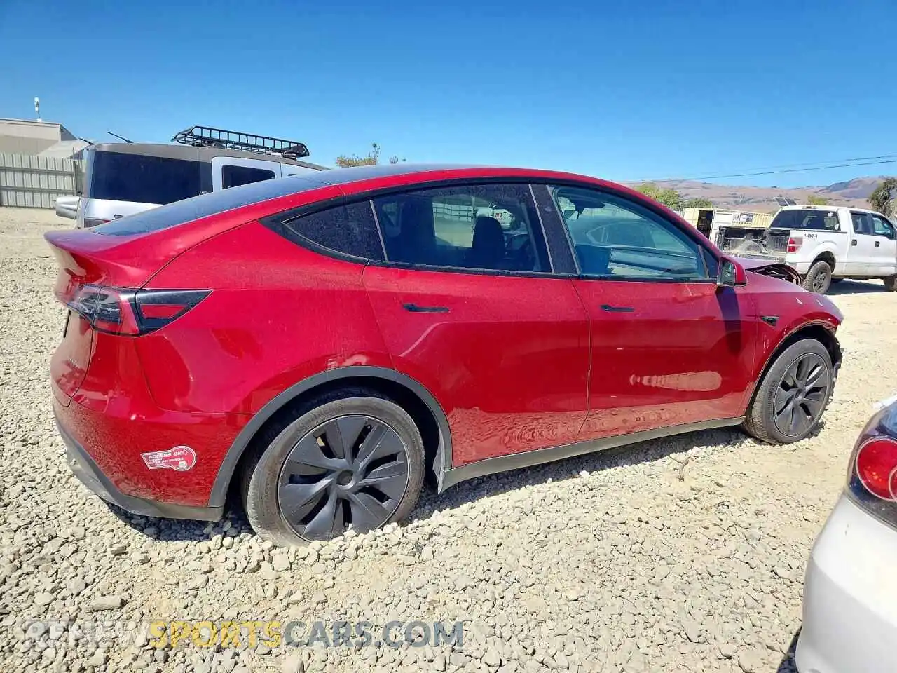 3 Photograph of a damaged car 7SAYGAEE3RF163560 TESLA MODEL Y 2024
